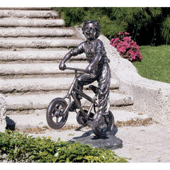 Out For A Ride Boy On Bike Statue