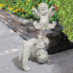 Set Of Topsy & Turvey Cherub Statues